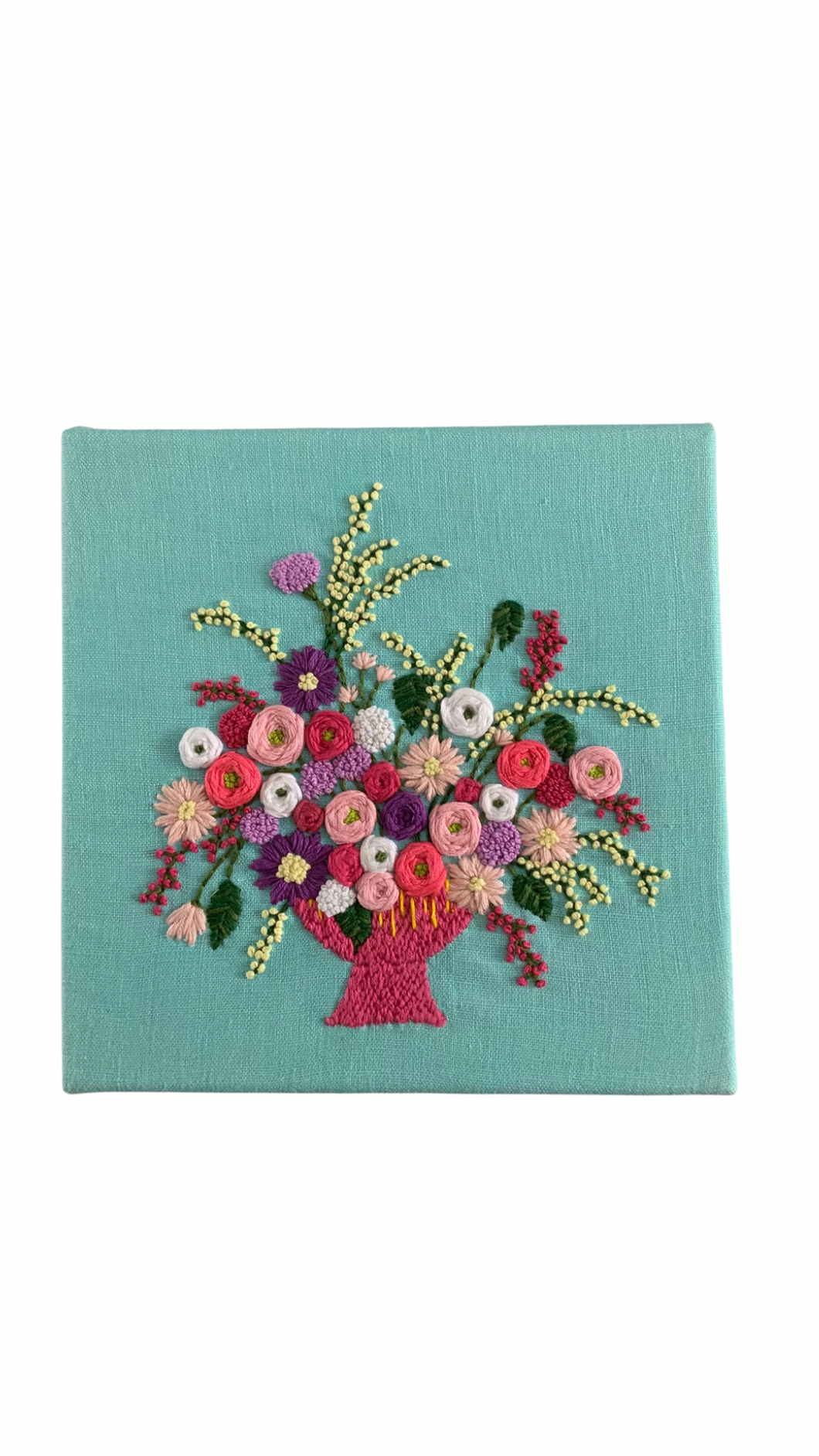 8“X8” Floral Embroidery on Turquoise Linen.