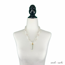 Load image into Gallery viewer, Glass + Kunzite Beaded Necklace with Quartz Crystal Pendant
